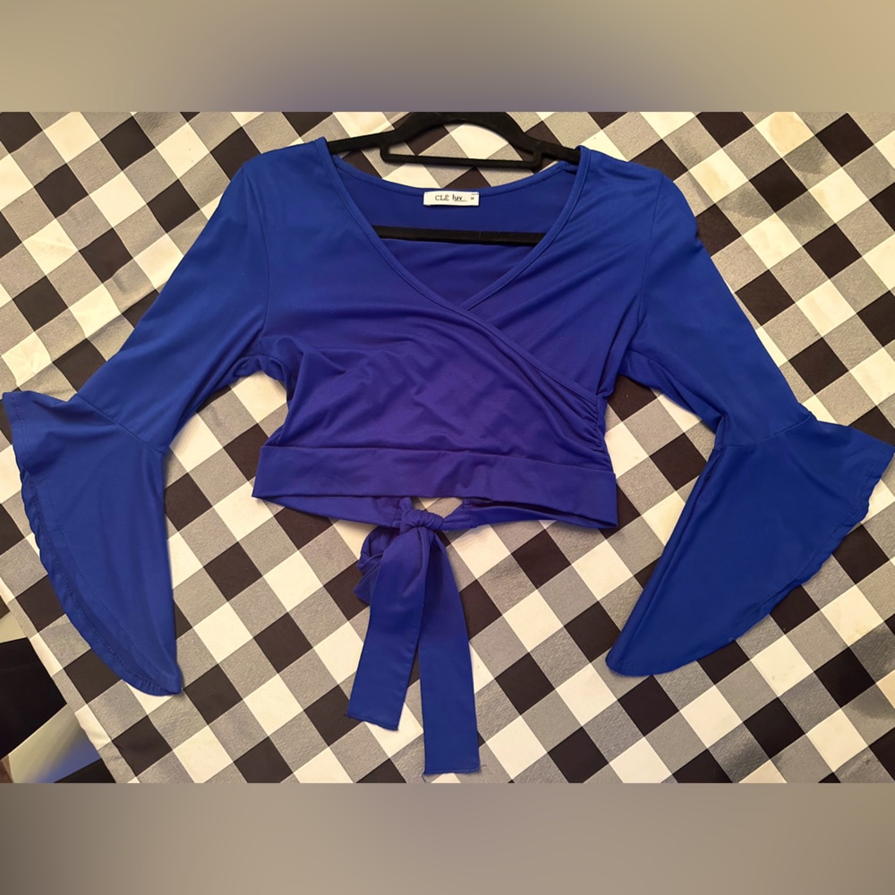 Blue crop top with bell sleeves & tie in back